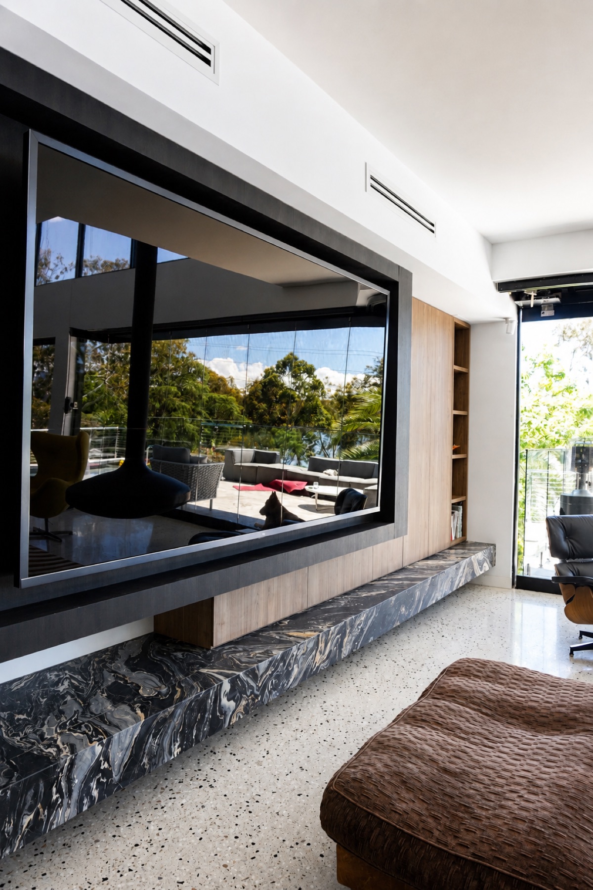 Entertainment unit project 9 with stone bench and timber cabinetry